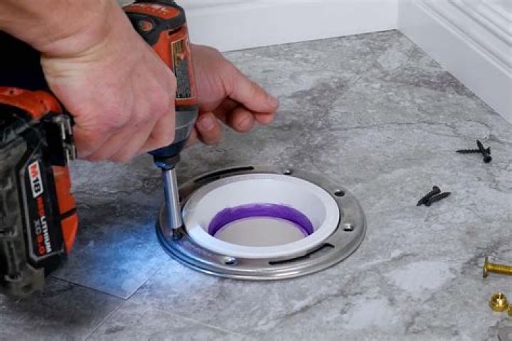 Does tile go over tub flange