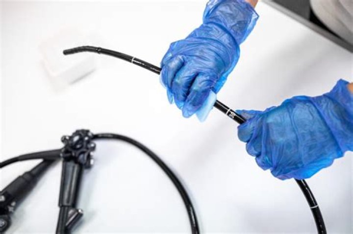 How is an endoscope cleaned