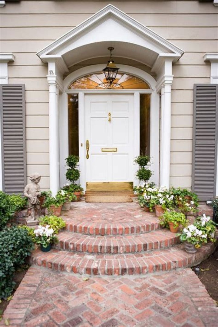 Should front door match trim