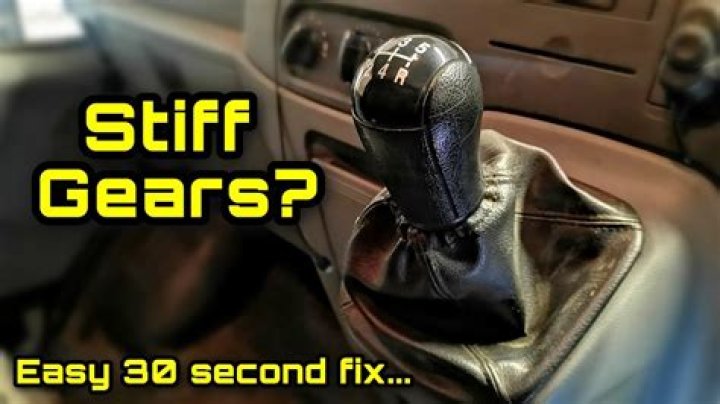 What causes stiff gear shift