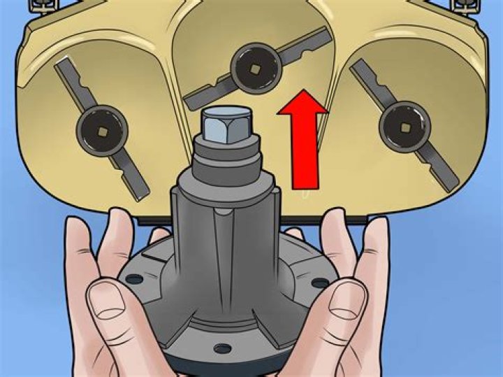 What is a mower deck spindle