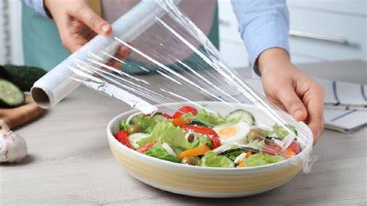 Why does plastic wrap cling